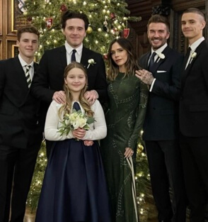 Ted Beckham's son David Beckham with his wife and children